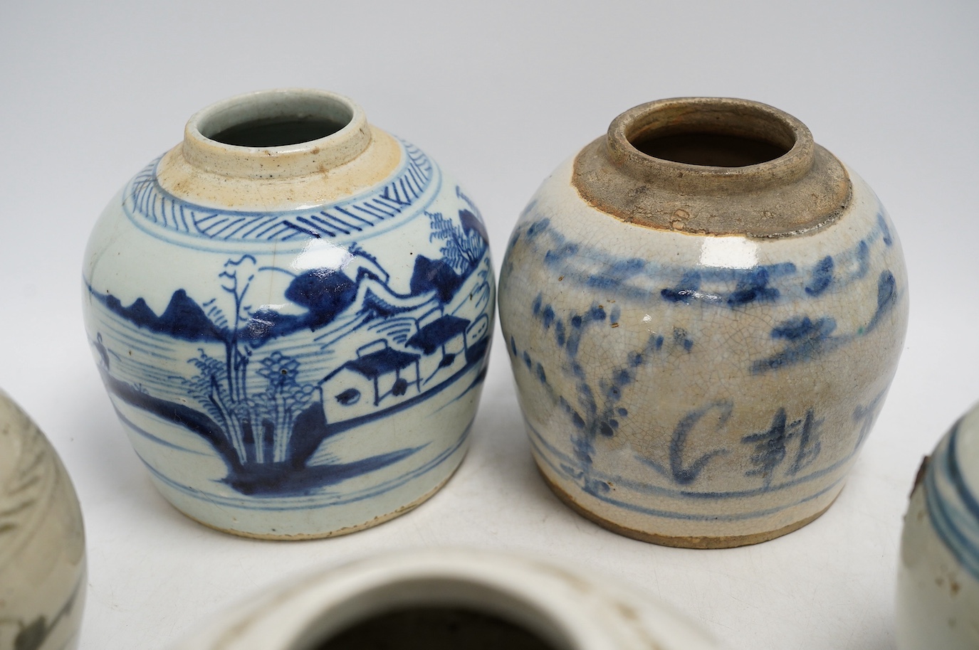 Five 18th/19th century Chinese blue and white ginger jars and two ‘pagoda’ models, tallest 26cm. Condition - fair